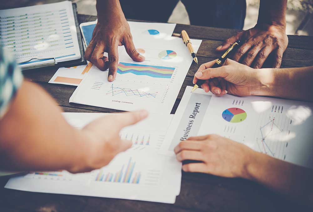group-business-people-analysis-with-marketing-report-graph-young-specialists-are-discussing-business-ideas-new-digital-start-up-project